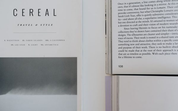 Close-up of open Cereal magazine showcasing travel and style content.